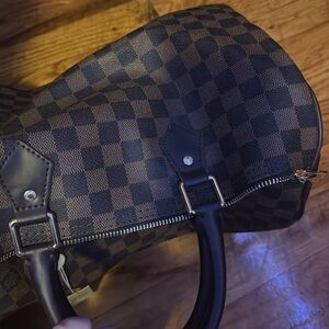 Medium size brown handbag